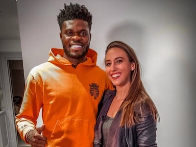 Semra Hunter and Thomas Partey posing together at Thomas' house